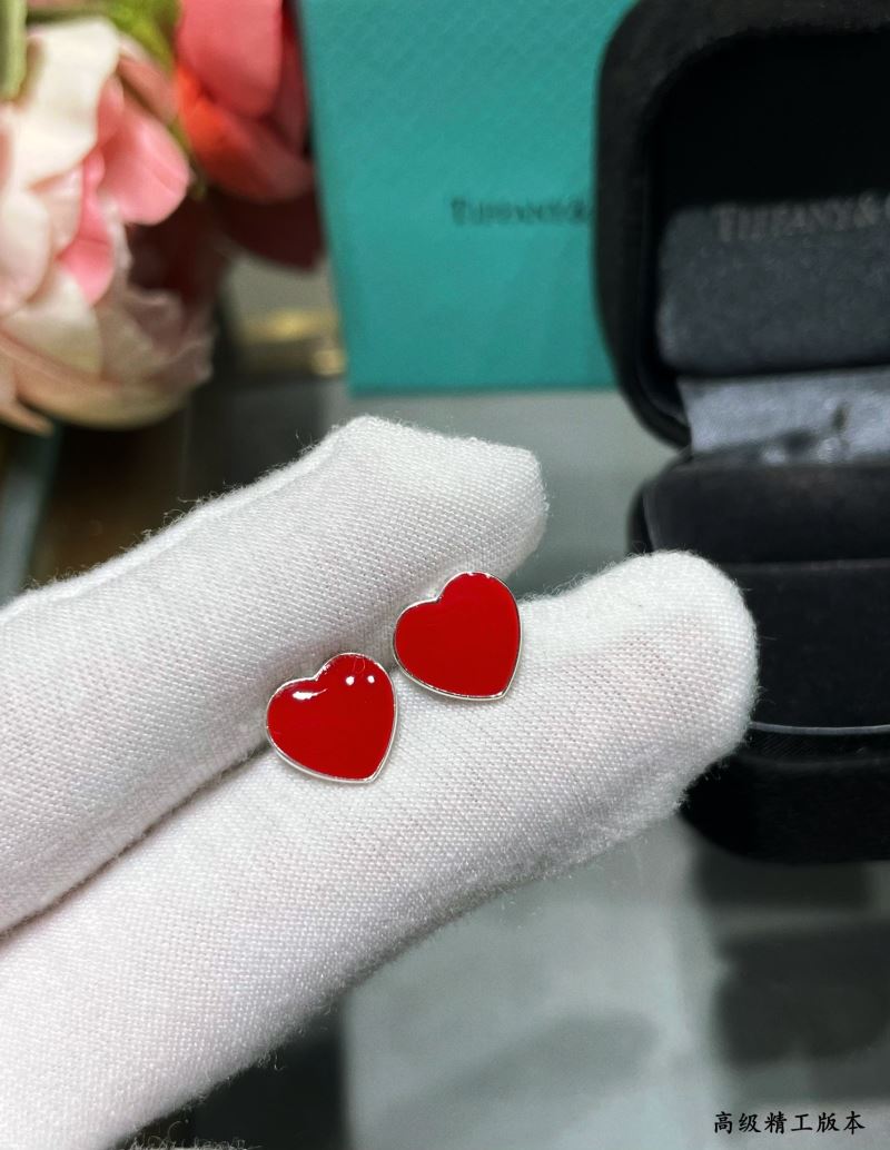 T*f*ny earrings